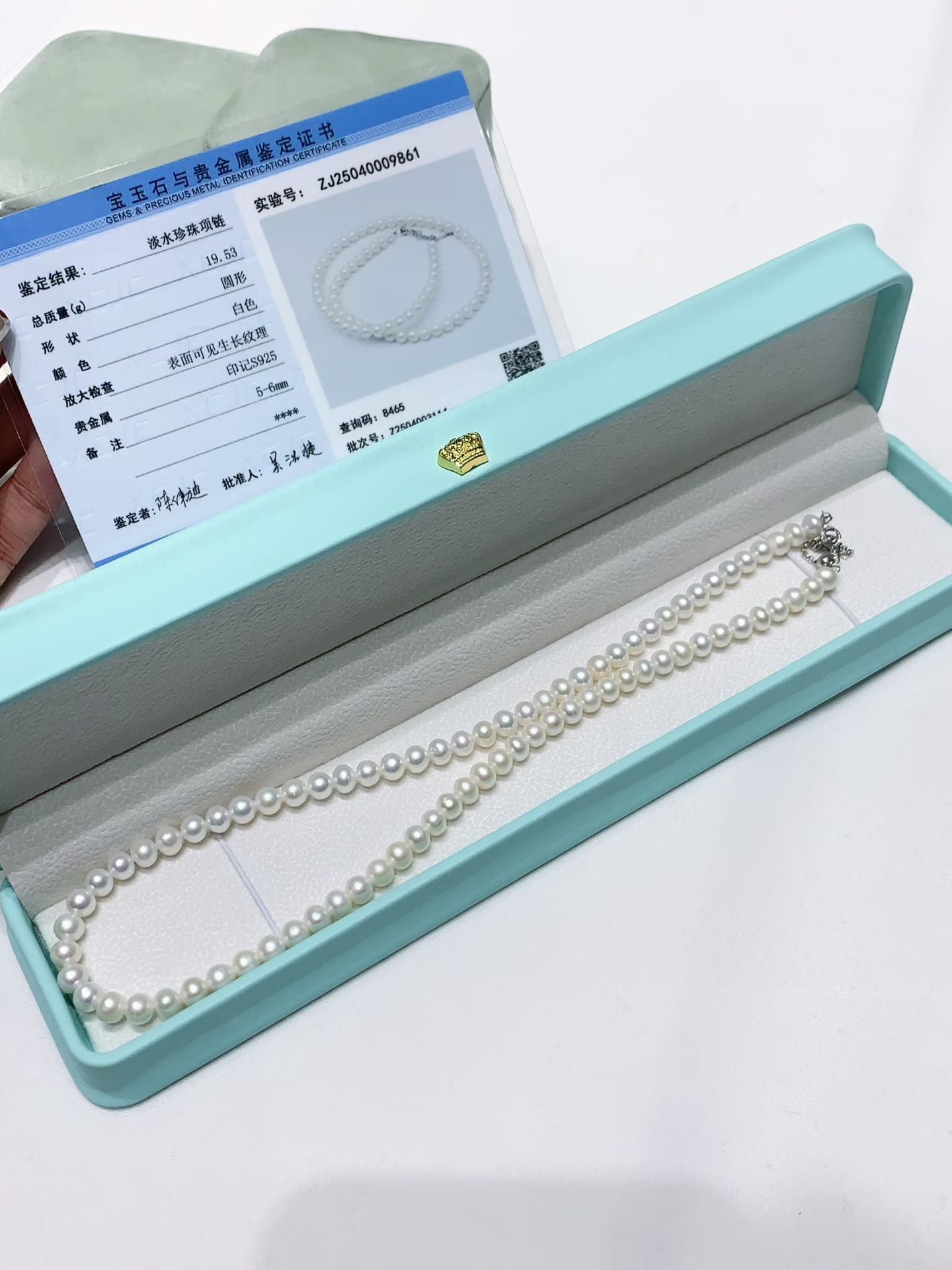 Fine 5-6mm round white freshwater pearl necklace